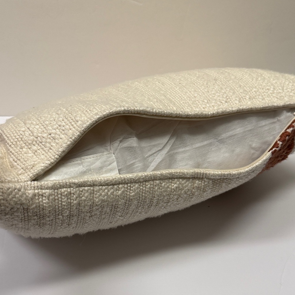 Textured Cream Throw Pillow with Rust Accent and Tassels - Picture 3 of 5